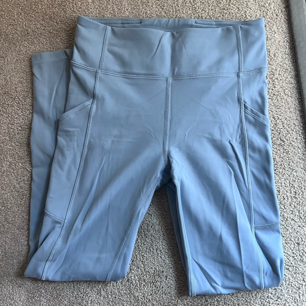 Lululemon Size 6 Light Blue High-Waisted Leggings with pockets 28”